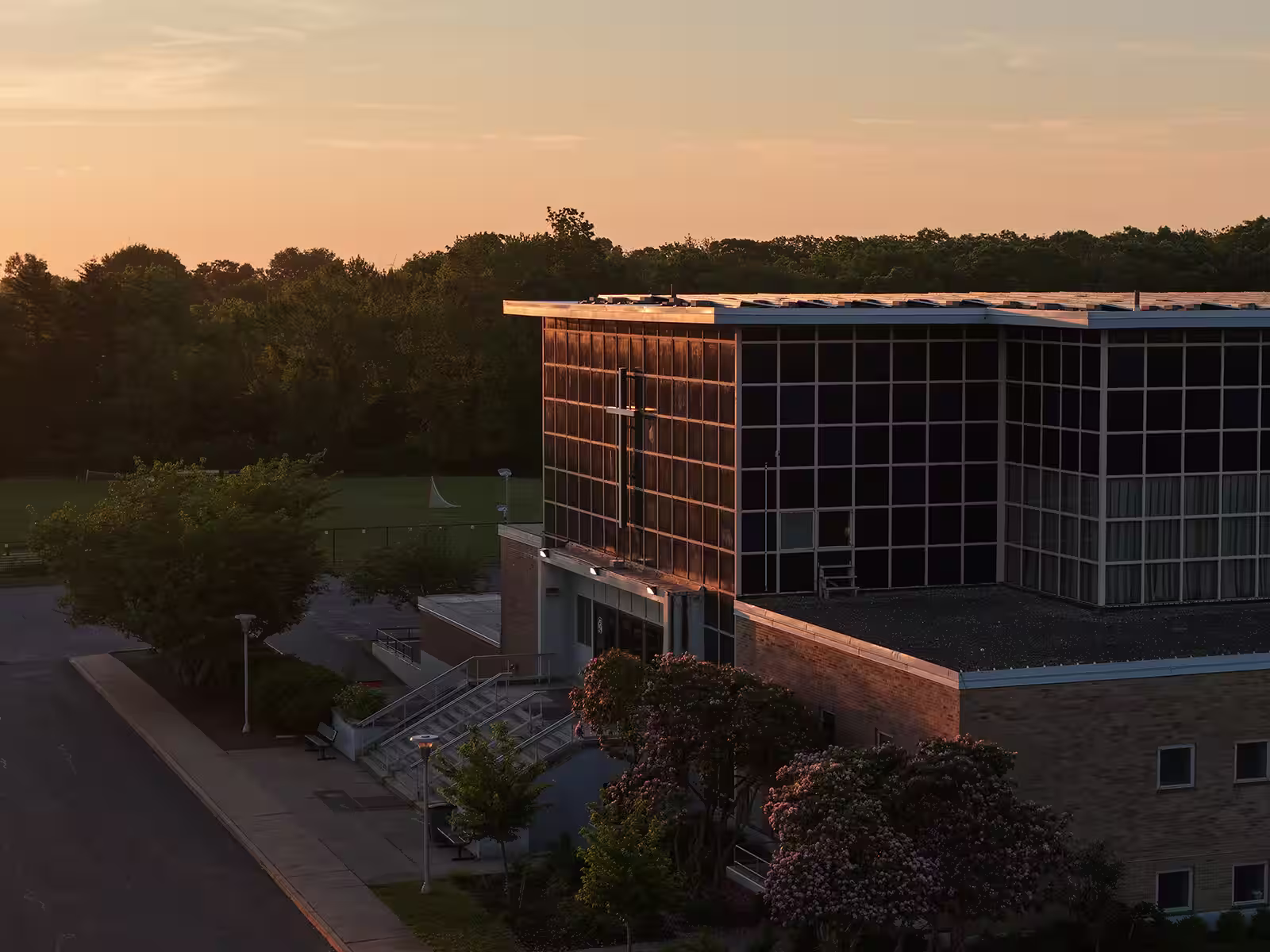 Bishop Stang High School campus at sunrise